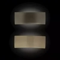 Oluce Lens lampada bi-emissione da parete