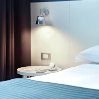 Flos Romeo Babe Wall Lamp in Glass by Philippe Starck
