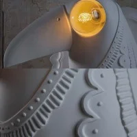 Karman Cubano toucan-shaped wall lamp