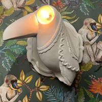 Karman Cubano toucan-shaped wall lamp